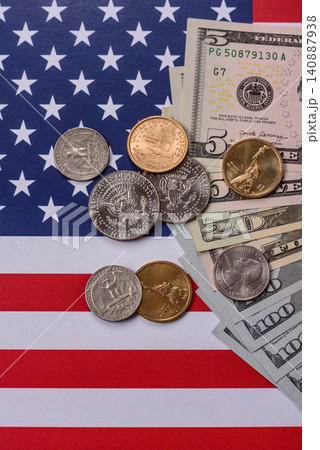 Paper US dollar bills of various denominations and cent coins as a business tool. Cash US dollars Paper US dollar bills of various denominations and cent coins as a business tool. Cash US dollars 140887938