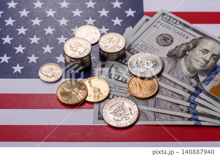 Paper US dollar bills of various denominations and cent coins as a business tool. Cash US dollars Paper US dollar bills of various denominations and cent coins as a business tool. Cash US dollars 140887940