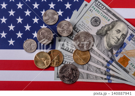 Paper US dollar bills of various denominations and cent coins as a business tool. Cash US dollars Paper US dollar bills of various denominations and cent coins as a business tool. Cash US dollars 140887941