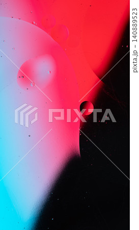 Oil and water creating abstract patterns, shapes, and colorful bubbles on a gradient background Oil and water creating abstract patterns, shapes, and colorful bubbles on a gradient background 140889523