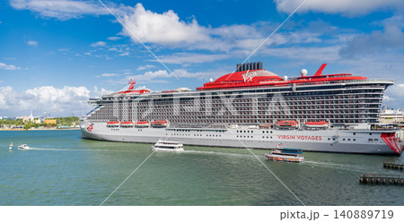 Miami, Florida, USA - November 03, 2024: Virgin voyages. Cruise ship vacation. Cruise ship in summer vacation. Cruise ship vacation and travel at sea. Luxury liner Miami, Florida, USA - November 03, 2024: Virgin voyages. Cruise ship vacation. Cruise ship in summer vacation. Cruise ship vacation and travel at sea. Luxury liner 140889719