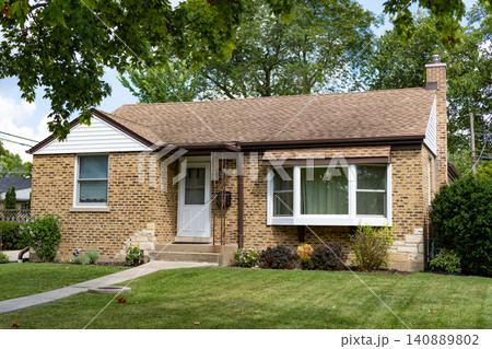 Suburban house architecture. Suburb exterior with private housing. Suburban neighborhood. Private family home architecture. House exterior. Private house in suburban area. Detached house Suburban house architecture. Suburb exterior with private housing. Suburban neighborhood. Private family home architecture. House exterior. Private house in suburban area. Detached house 140889802