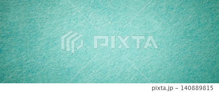 Light turquoise suede fabric background with matte microfiber texture, soft pastel mint felt surface with vignette in macro Light turquoise suede fabric background with matte microfiber texture, soft pastel mint felt surface with vignette in macro 140889815