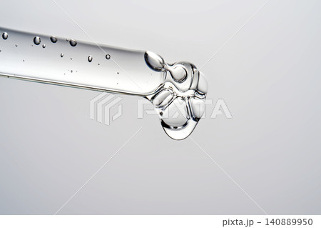 Clear serum dripping from pipette offering barrier repair 140889950
