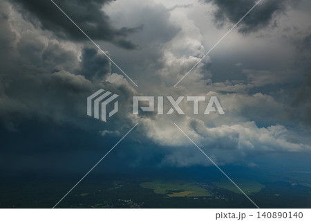 Angry supercell storm influenced by Climate change. Storm seen in the High Tatras, Slovakia Angry supercell storm influenced by Climate change. Storm seen in the High Tatras, Slovakia 140890140