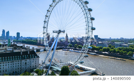 Distant Panorama in downtown include distant Ferris wheel, Thames river with pleasure boats and Big Ben tower Distant Panorama in downtown include distant Ferris wheel, Thames river with pleasure boats and Big Ben tower 140890500