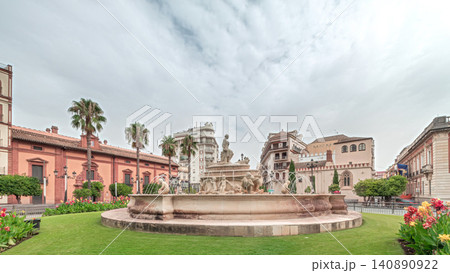 Hispalis Fountain in Seville surrounded by flowers and historical buildings timelapse Hispalis Fountain in Seville surrounded by flowers and historical buildings timelapse 140890922