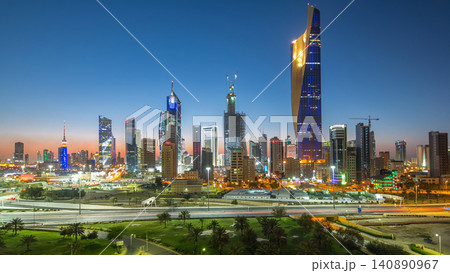 Skyline with Skyscrapers day to night timelapse in Kuwait City downtown illuminated at dusk. Kuwait City, Middle East Skyline with Skyscrapers day to night timelapse in Kuwait City downtown illuminated at dusk. Kuwait City, Middle East 140890967