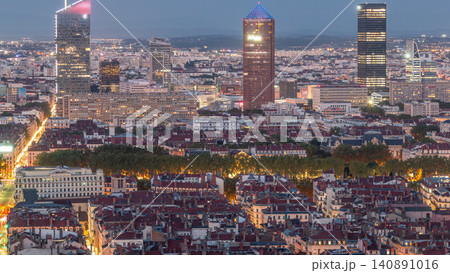 Panoramic aerial view of Lyon after sunset from Fourviere Hill day to night transition. France Panoramic aerial view of Lyon after sunset from Fourviere Hill day to night transition. France 140891016