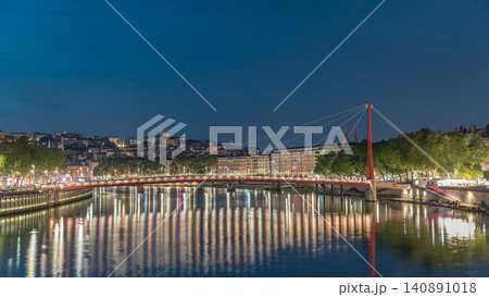 Hyperlapse of the Passerelle du Palais du Justice bridge over the Saone River in Lyon, transition from day to night timelapse. Hyperlapse of the Passerelle du Palais du Justice bridge over the Saone River in Lyon, transition from day to night timelapse. 140891018