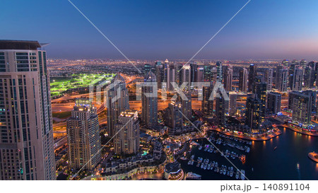 Dubai Marina with yachts day to night aerial timelapse Dubai Marina with yachts day to night aerial timelapse 140891104