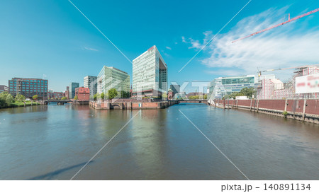 Panorama showing Hamburg HafenCity skyline timelapse at Ericusgraben with a view of modern Spiegel office buildings Panorama showing Hamburg HafenCity skyline timelapse at Ericusgraben with a view of modern Spiegel office buildings 140891134