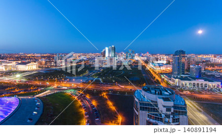 Elevated view over the city center and central business district day to night timelapse, Central Asia, Kazakhstan, Astana 140891194