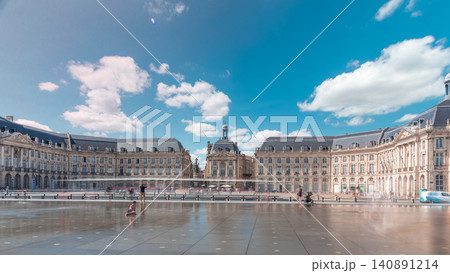 Place de la Bourse and Miroir d'eau timelapse hyperlapse in Bordeaux, France, reflecting historic architecture Place de la Bourse and Miroir d'eau timelapse hyperlapse in Bordeaux, France, reflecting historic architecture 140891214