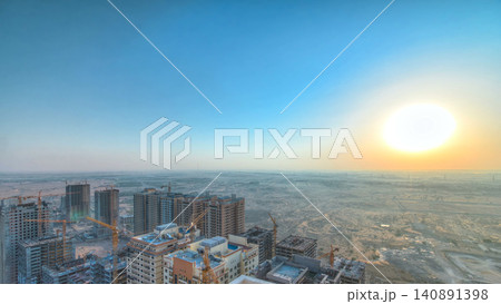 Cityscape of Ajman from rooftop during sunrise timelapse. United Arab Emirates. 140891398