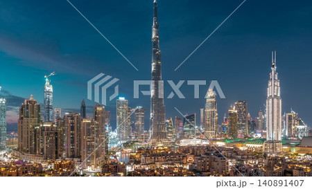 Dubai Downtown skyline day to night timelapse with Burj Khalifa and other towers panoramic view from the top in Dubai Dubai Downtown skyline day to night timelapse with Burj Khalifa and other towers panoramic view from the top in Dubai 140891407