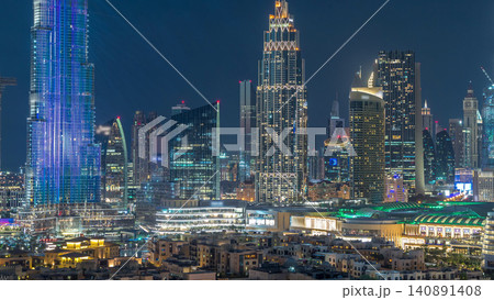 Dubai Downtown skyline day to night timelapse with towers panoramic view from the top in Dubai Dubai Downtown skyline day to night timelapse with towers panoramic view from the top in Dubai 140891408