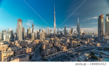 Dubai Downtown skyline timelapse with Burj Khalifa and other towers during sunrise panoramic view from the top in Dubai Dubai Downtown skyline timelapse with Burj Khalifa and other towers during sunrise panoramic view from the top in Dubai 140891412