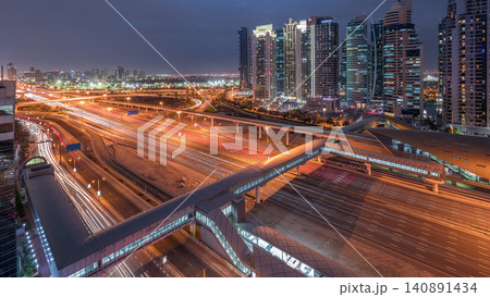 Aerial top view to Sheikh Zayed road near Dubai Marina and JLT day to night timelapse, Dubai. Aerial top view to Sheikh Zayed road near Dubai Marina and JLT day to night timelapse, Dubai. 140891434