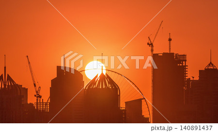 Dubai Marina skyscrapers from golf course sunset timelapse, Dubai, United Arab Emirates Dubai Marina skyscrapers from golf course sunset timelapse, Dubai, United Arab Emirates 140891437