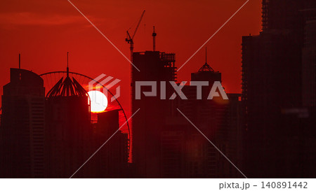 Dubai Marina skyscrapers from golf course sunset timelapse, Dubai, United Arab Emirates Dubai Marina skyscrapers from golf course sunset timelapse, Dubai, United Arab Emirates 140891442