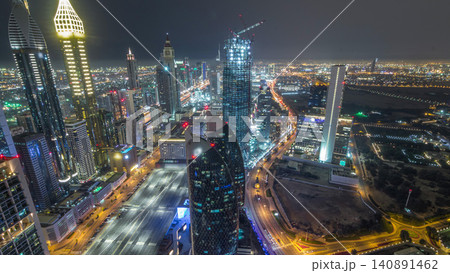 Skyline of the buildings of Sheikh Zayed Road and DIFC aerial night timelapse in Dubai, UAE. Skyline of the buildings of Sheikh Zayed Road and DIFC aerial night timelapse in Dubai, UAE. 140891462