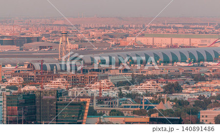 View of modern buildings in luxury Dubai city at sunset aerial timelapse View of modern buildings in luxury Dubai city at sunset aerial timelapse 140891486