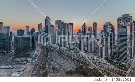 Modern residential and office complex with many towers aerial timelapse at Business Bay, Dubai, UAE. Modern residential and office complex with many towers aerial timelapse at Business Bay, Dubai, UAE. 140891501
