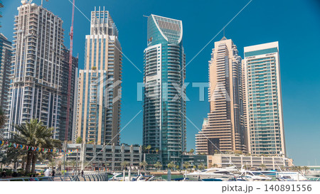 Dubai marina bay with yachts an boats timelapse Dubai marina bay with yachts an boats timelapse 140891556