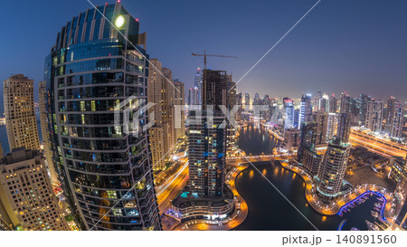 Beautiful aerial top view day to night transition timelapse of Dubai Marina canal Beautiful aerial top view day to night transition timelapse of Dubai Marina canal 140891560