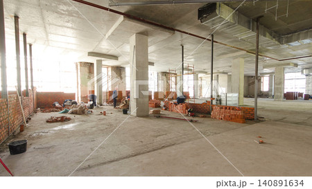 Bricklayers laying bricks to make a walls timelapse. Bricklayers laying bricks to make a walls timelapse. 140891634
