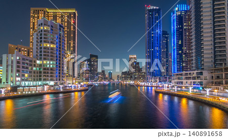 Dubai Marina towers and canal in Dubai day to night timelapse Dubai Marina towers and canal in Dubai day to night timelapse 140891658
