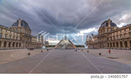 The Louvre museum pyramid at sunset timelapse in Paris, France The Louvre museum pyramid at sunset timelapse in Paris, France 140891707