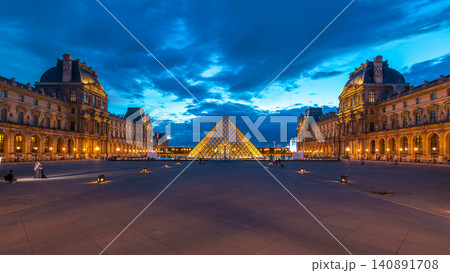 The Louvre museum pyramid after sunset day to night timelapse in Paris, France The Louvre museum pyramid after sunset day to night timelapse in Paris, France 140891708
