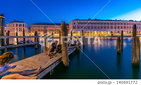 View to Rialto Market day to night timelapse after sunset, Venice, Italy viewed from pier across the Grand Canal View to Rialto Market day to night timelapse after sunset, Venice, Italy viewed from pier across the Grand Canal 140891772