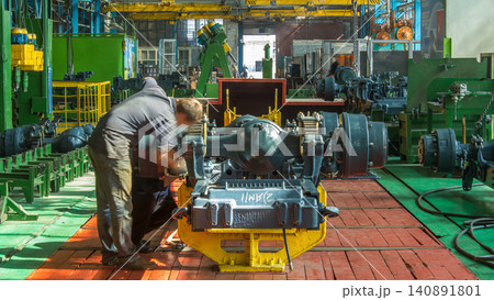 Conveyor assembly stage the body of tractor at big industrial factory timelapse Conveyor assembly stage the body of tractor at big industrial factory timelapse 140891801