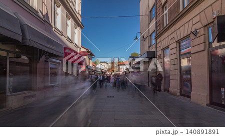 Walk on Ferhadija pedestrian street crowded with people timelapse hyperlapse Walk on Ferhadija pedestrian street crowded with people timelapse hyperlapse 140891891