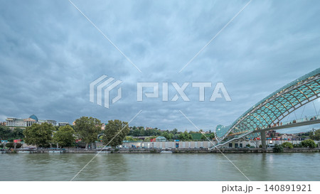 Timelapse panorama of the Bridge of Peace, a bow-shaped pedestrian bridge in Tbilisi, Georgia 140891921