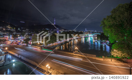 Colorful traditional houses panorama with wooden carved balconies in the Old Town of Tbilisi aerial timelapse, Georgia. 140891922