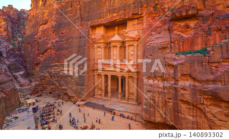 Petra, Wadi Musa, Jordan - Mar 06 2023, aerial view of Al-Khazneh tomb, symbol of the city of Petra, Wadi Musa, Jordan Petra, Wadi Musa, Jordan - Mar 06 2023, aerial view of Al-Khazneh tomb, symbol of the city of Petra, Wadi Musa, Jordan 140893302