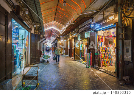 Jeddah, Saudi Arabia - Mar 08 2023, panoramic views, tourists and locals stroll through the fabric market in the center of the old town of Jeddah, Saudi Arabia Jeddah, Saudi Arabia - Mar 08 2023, panoramic views, tourists and locals stroll through the fabric market in the center of the old town of Jeddah, Saudi Arabia 140893310