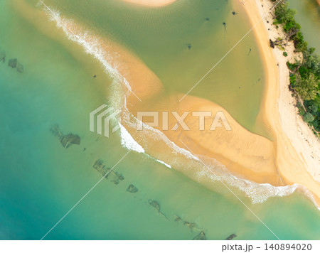 Aerial view of sea beach sand background Aerial view of sea beach sand background 140894020