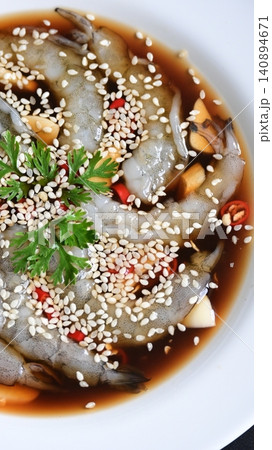 shrimp in soy sauce on white plate, korean style menu shrimp in soy sauce on white plate, korean style menu 140894671