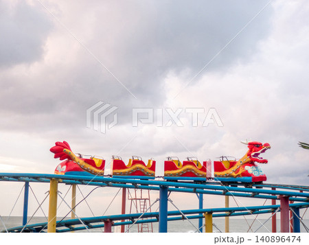 Carousel closed for the winter. Abandoned Luna Park.  Closed. Carousel in the shape of a dragon 140896474