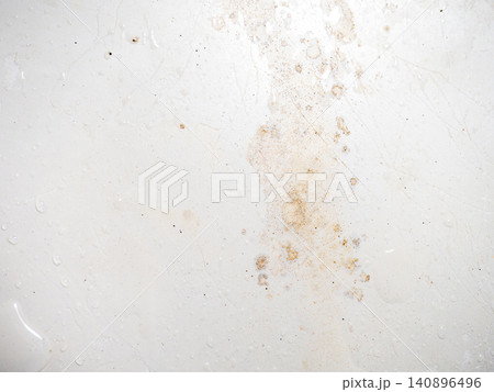Mold on bathroom enamel. Mold spores in the bathroom. Black dots on a white background. A problem for everyday life. The need for a cleaning agent. Mold on bathroom enamel. Mold spores in the bathroom. Black dots on a white background. A problem for everyday life. The need for a cleaning agent. 140896496
