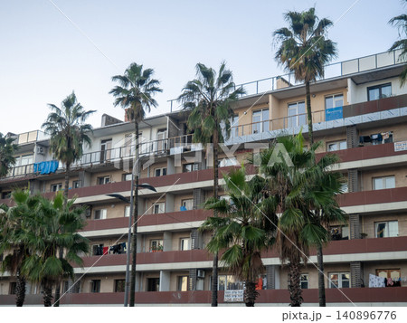 Housing on several floors in a southern city. Houses for rent in the resort. Autumn in the south. Mainly cloudy. Housing on several floors in a southern city. Houses for rent in the resort. Autumn in the south. Mainly cloudy. 140896776