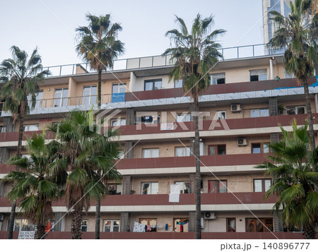 Housing on several floors in a southern city. Houses for rent in the resort. Autumn in the south. Mainly cloudy. Housing on several floors in a southern city. Houses for rent in the resort. Autumn in the south. Mainly cloudy. 140896777