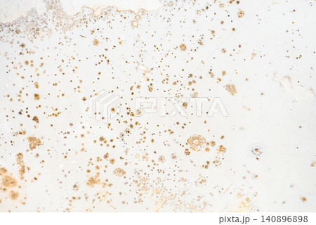 Mold on the surface of the bathroom. Dark mold close-up on bathroom enamel. Dirty white surface. Mold on the surface of the bathroom. Dark mold close-up on bathroom enamel. Dirty white surface. 140896898
