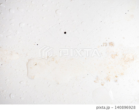 Mold on bathroom enamel. Mold spores in the bathroom. Black dots on a white background. A problem for everyday life. The need for a cleaning agent Mold on bathroom enamel. Mold spores in the bathroom. Black dots on a white background. A problem for everyday life. The need for a cleaning agent 140896928