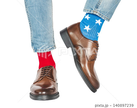 Men's legs, red and blue socks Men's legs, red and blue socks 140897239